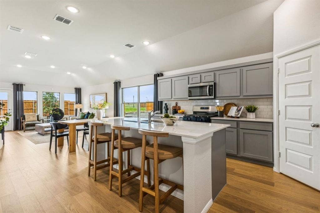 Kitchen in the Turquoise home plan – REPRESENTATIVE PHOTO