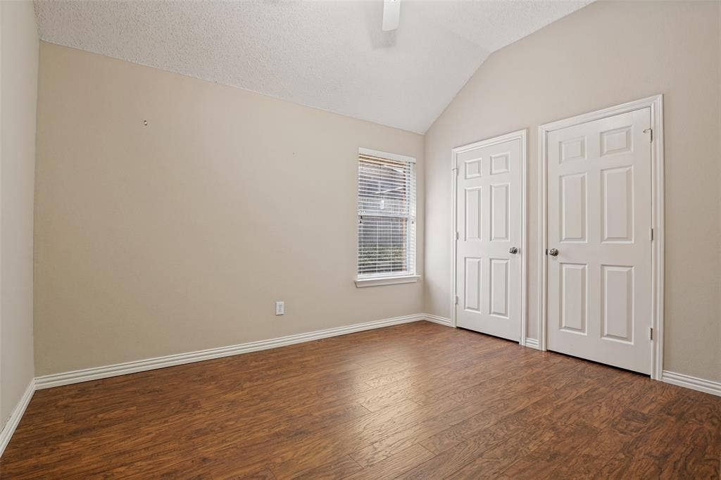 1909 Blackfoot Trail, Mesquite, TX 75149 Vaulted ceiling, wood-finish flooring, and dual six-panel interior doors