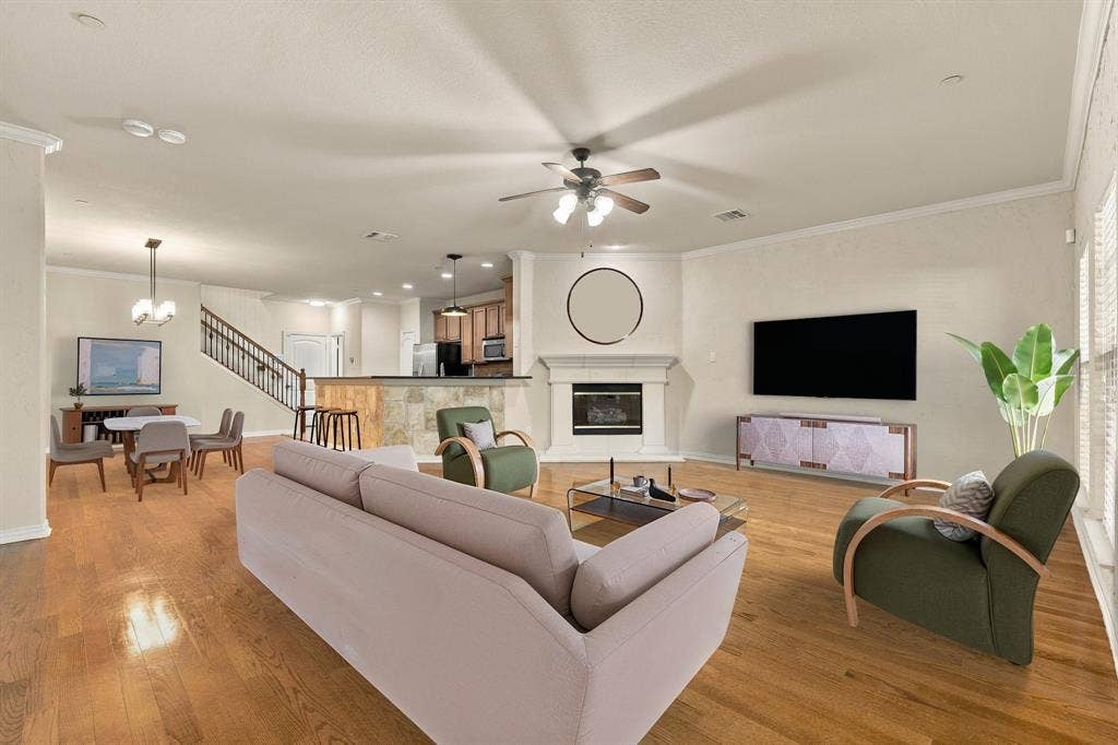 Open living space where the kitchen, dining, and living flow together, ideal for entertaining and everyday living. Virtual Staging.