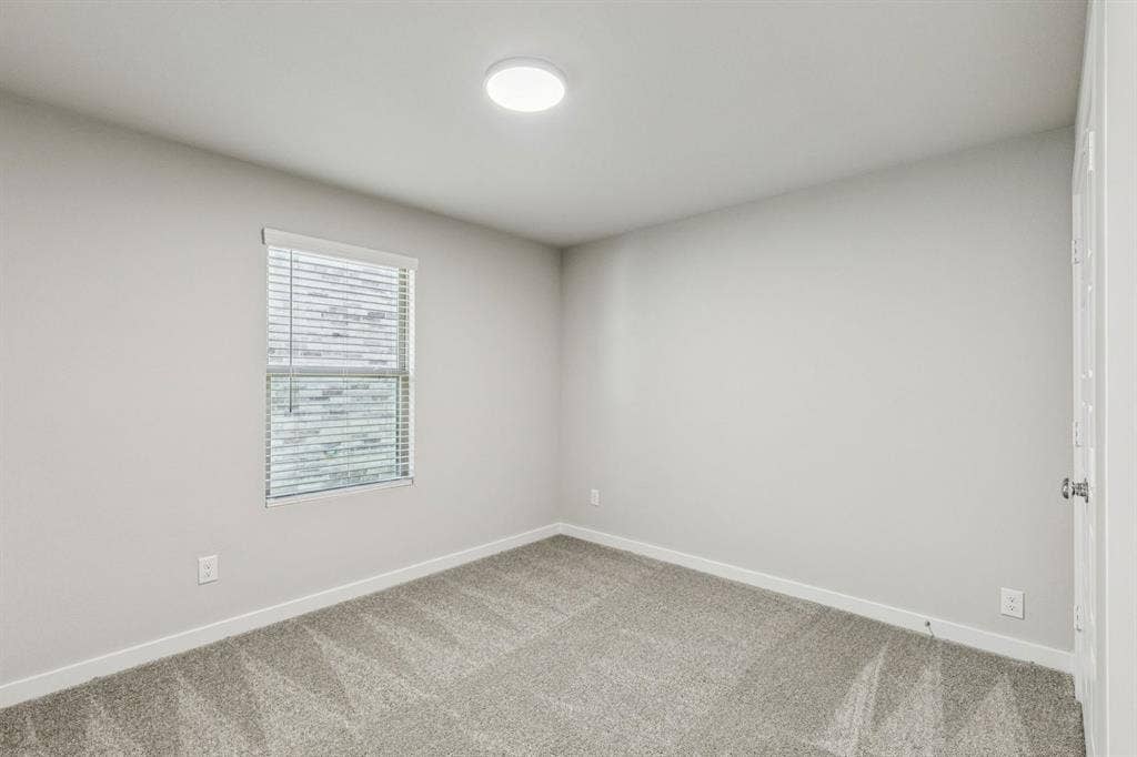 2408 Warm Glow Way, Princeton, TX 75407 Bedroom in the Harper home plan – REPRESENTATIVE PHOTO