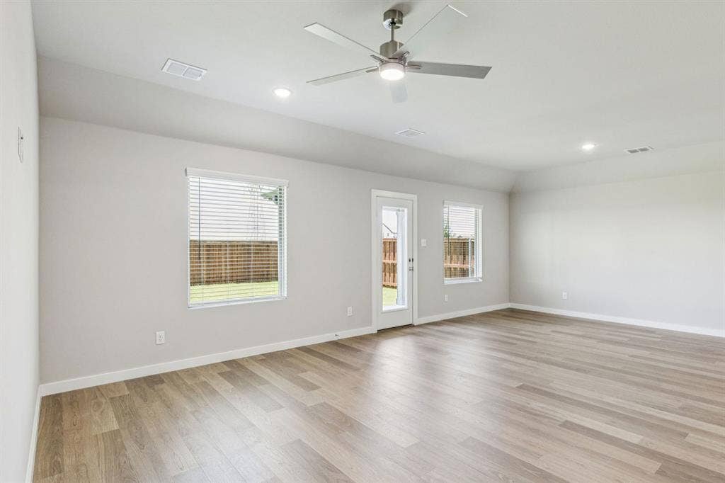 2408 Warm Glow Way, Princeton, TX 75407 Living Room in the Harper home plan – REPRESENTATIVE PHOTO