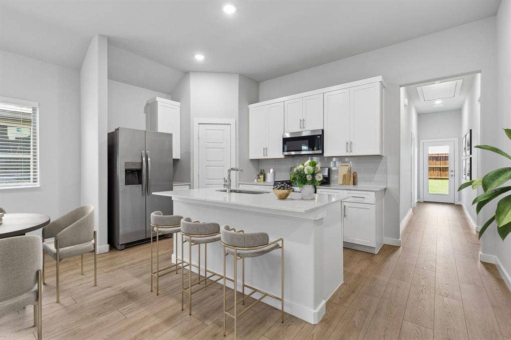 Kitchen in the Cypress home plan - REPRESENTATIVE PHOTO