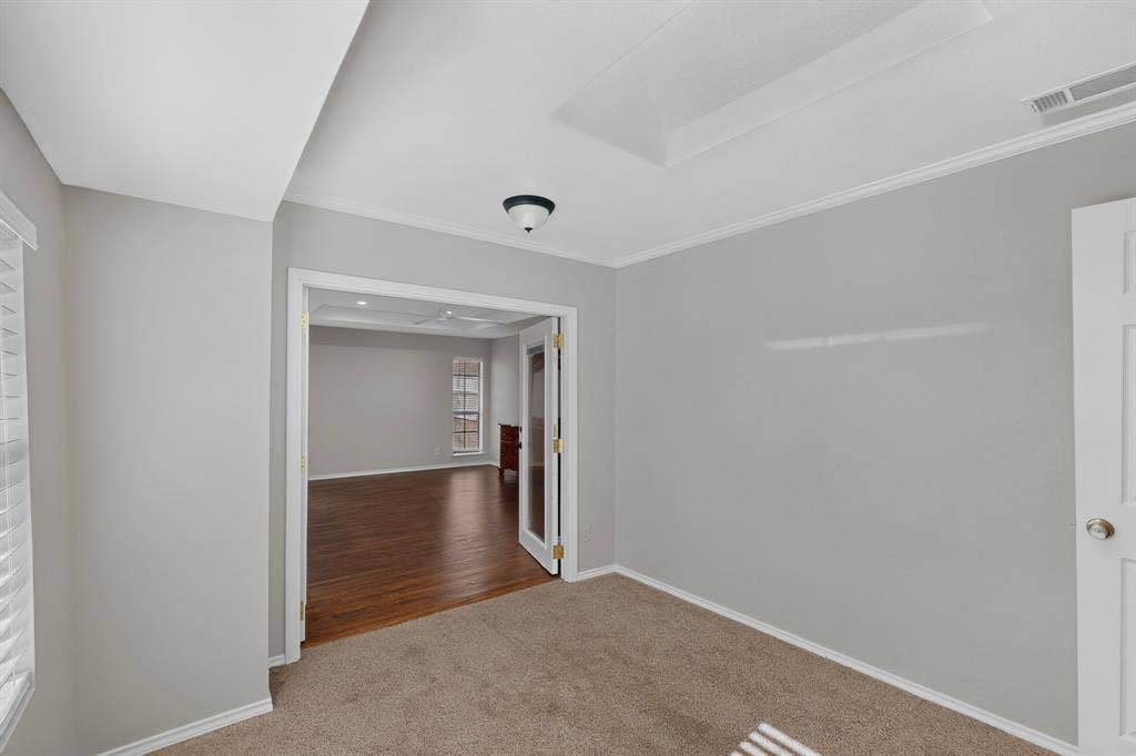 2413 Club Meadow Drive, Garland, TX 75041 Recessed ceiling detail, light gray wall paint, white trim, carpet flooring, and a ceiling-mounted light fixture