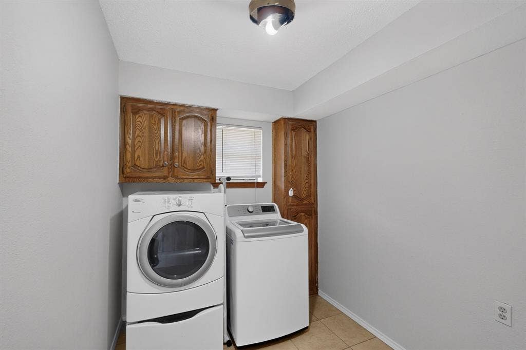 2413 Club Meadow Drive, Garland, TX 75041 Built-in cabinetry and dedicated utility space