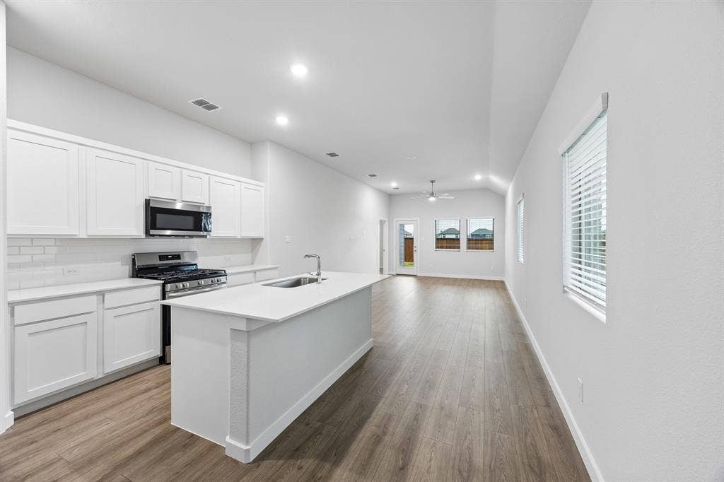 Kitchen in the Cedar home plan – REPRESENTATIVE PHOTO