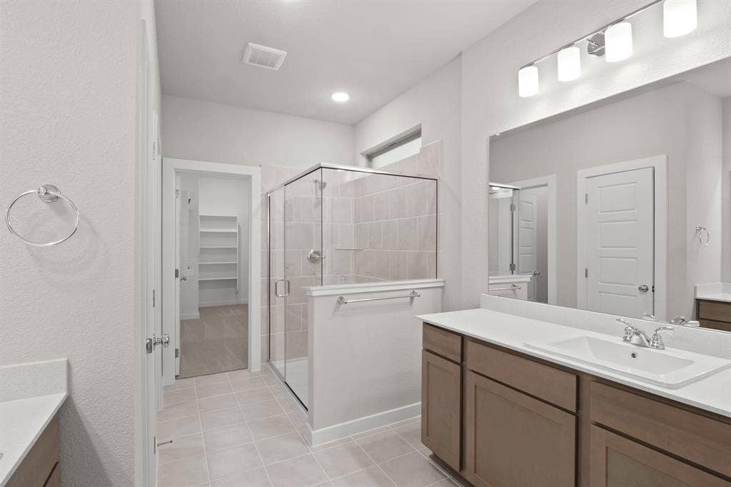 Primary Bathroom in the Willow home plan – REPRESENTATIVE PHOTO
