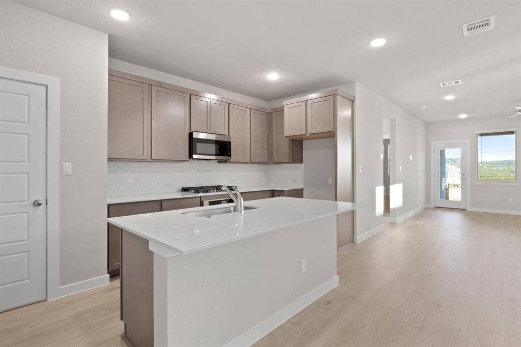 Kitchen in the Willow home plan – REPRESENTATIVE PHOTO