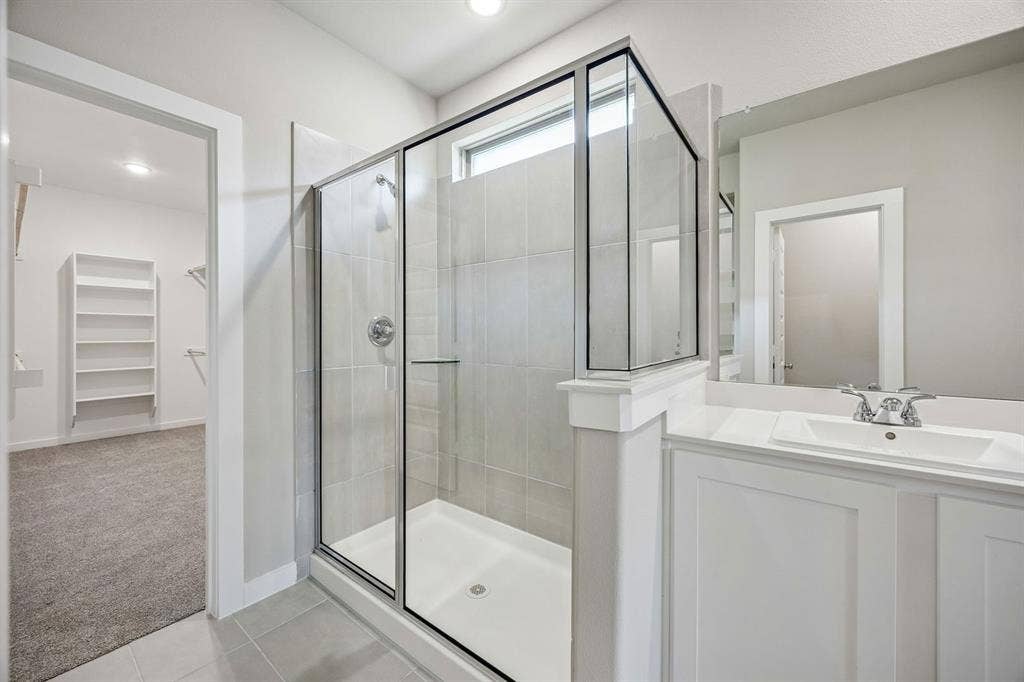 Primary Bathroom in the Willow home plan – REPRESENTATIVE PHOTO