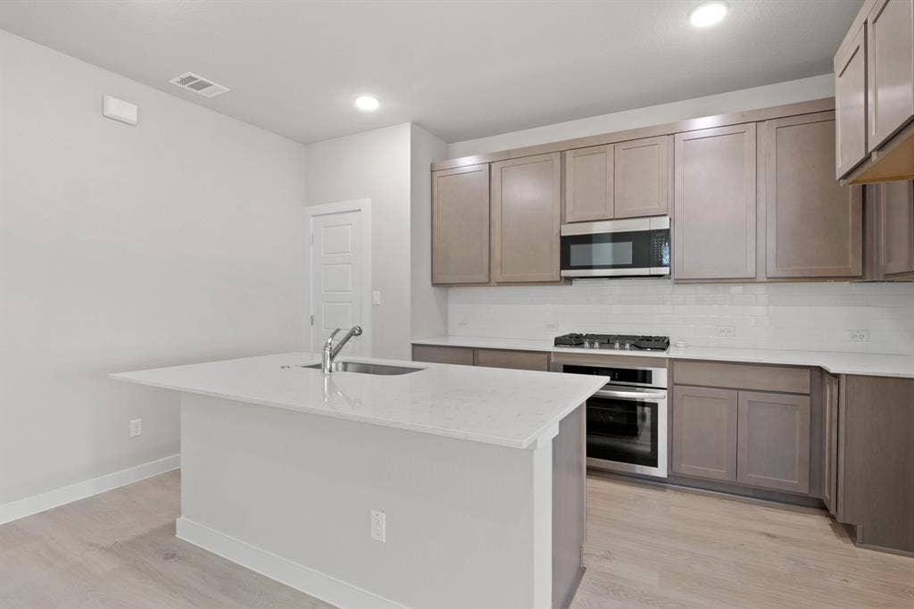 Kitchen in the Willow home plan – REPRESENTATIVE PHOTO