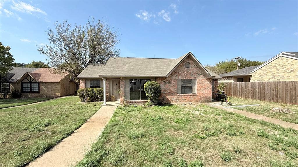510 Matterhorn Street, Cedar Hill, TX 75104 Single-story brick exterior featuring a covered front porch, gabled roofline, concrete walkway, and shuttered windows