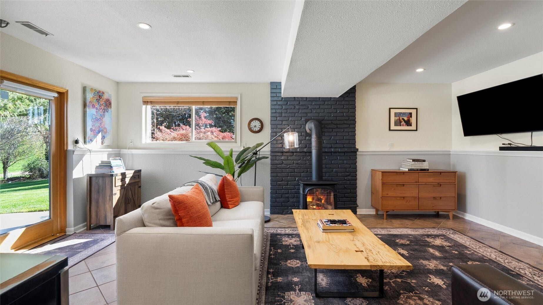 The walk-out lower floor is highlighted by this flexible living area. Currently used as a media room and extra bedroom with queen pull-out, it is ready to suit your particular needs.