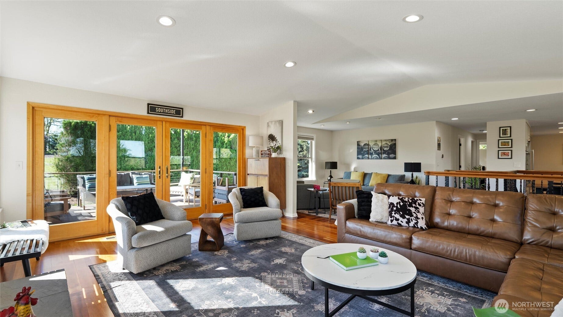 There is plenty or room to spread out, including the covered deck on just the other side of the classic Anderson french doors.