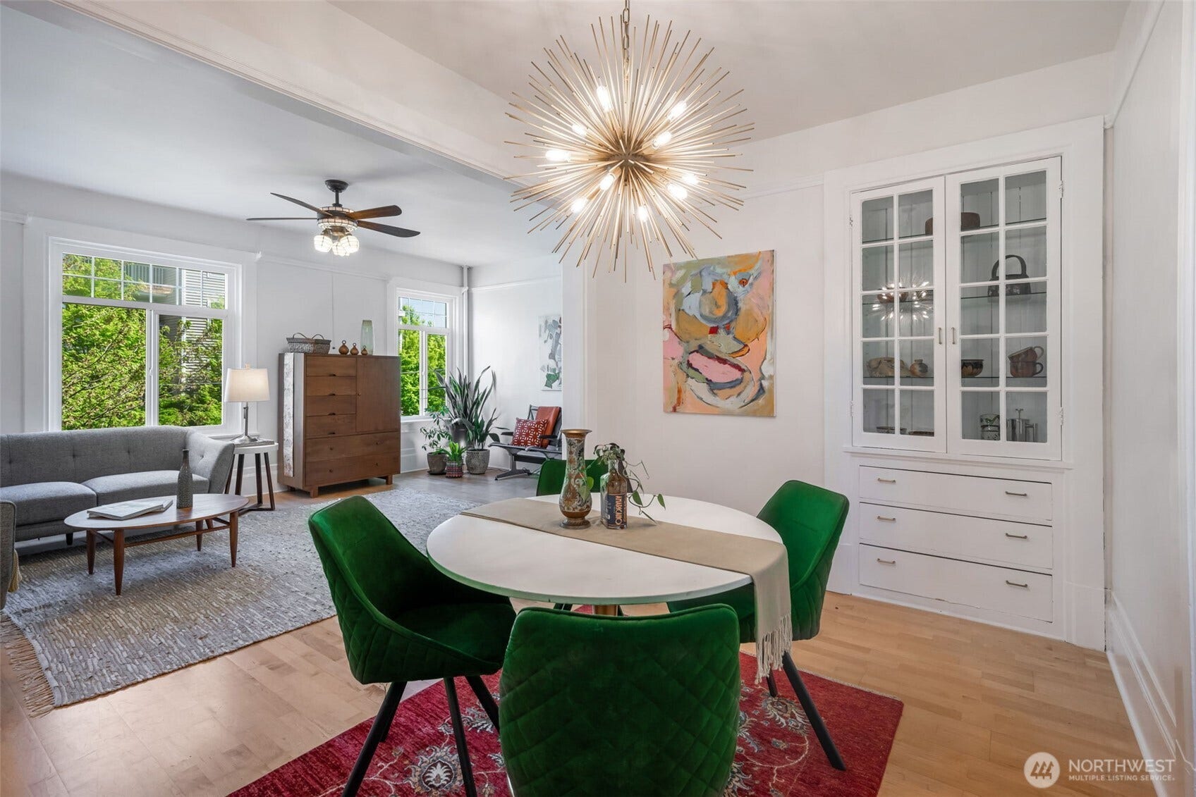 403 Terry Avenue, #206, Seattle, WA 98104 Dedicated dining with a beautiful MCM 12 bulb dimmable chandelier