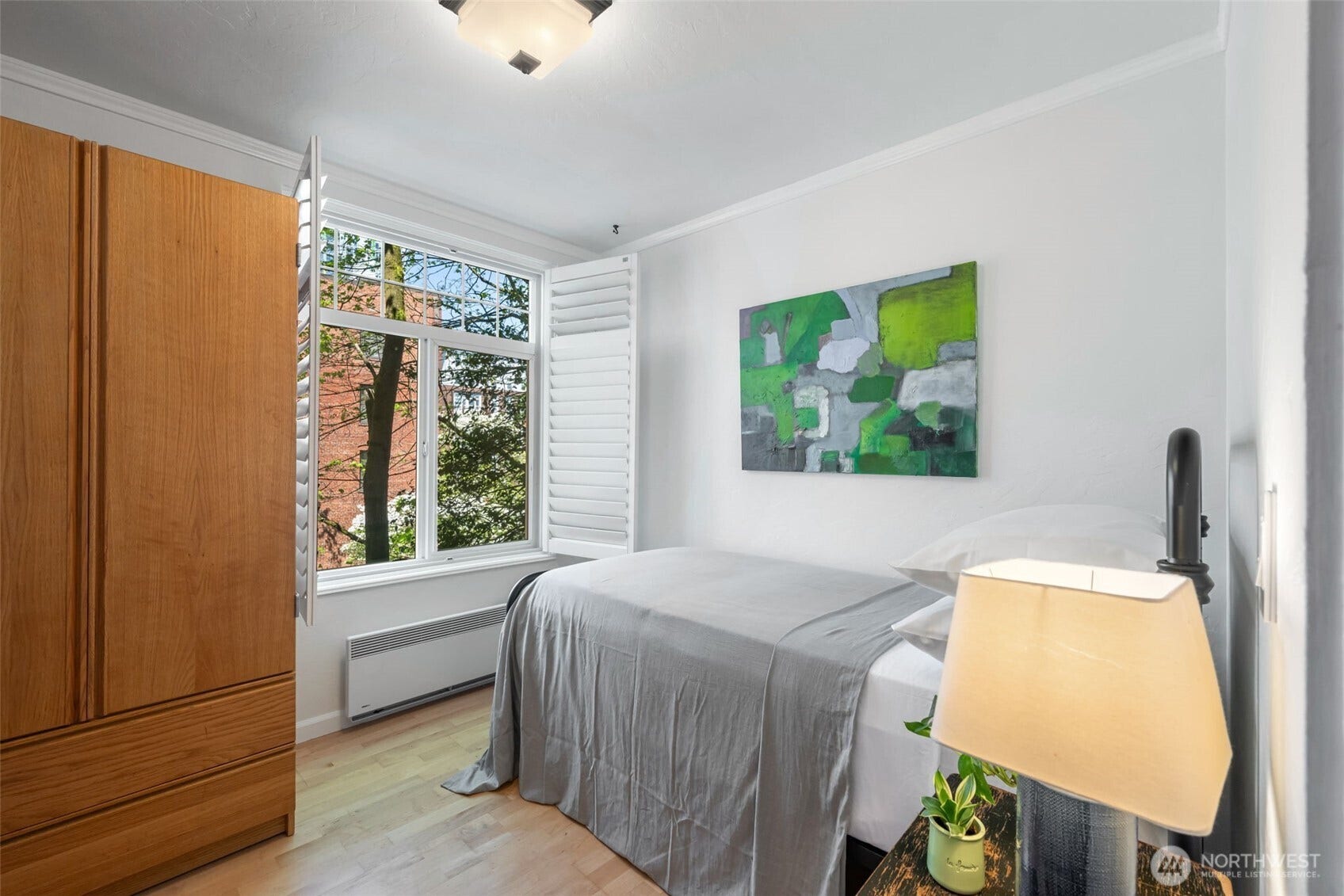 403 Terry Avenue, #206, Seattle, WA 98104 Custom made plantation shutters throughout. Second bedroom
