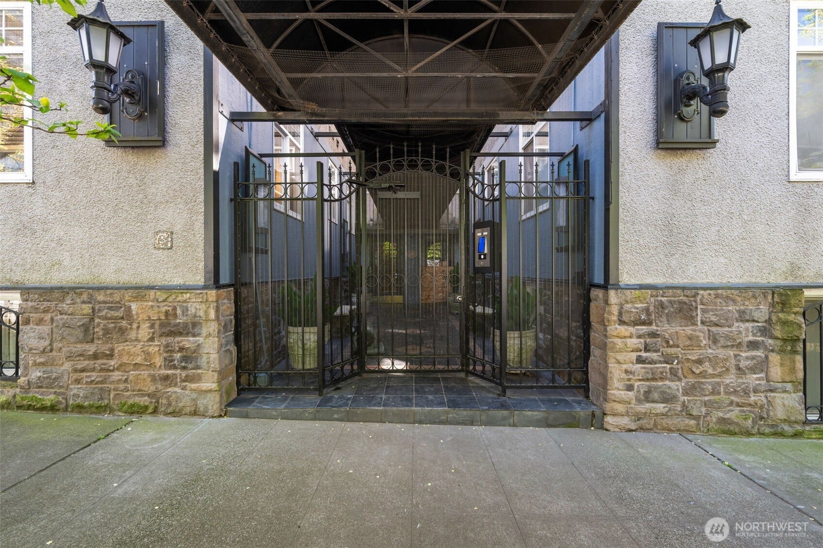 403 Terry Avenue, #206, Seattle, WA 98104 Secured court yard features state of the art ButterflyMX app driven keyless secured entry.