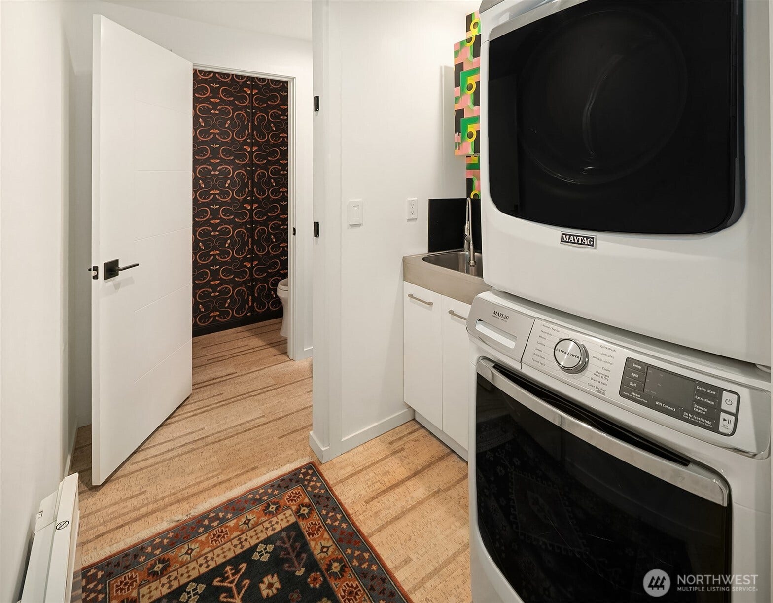 15628 8th Avenue SW, #B, Burien, WA 98166 Before the remodel, this was a folding door closet with a washer, dryer and some shelves. The laundry sink was a fantastic addition to the floorplan.