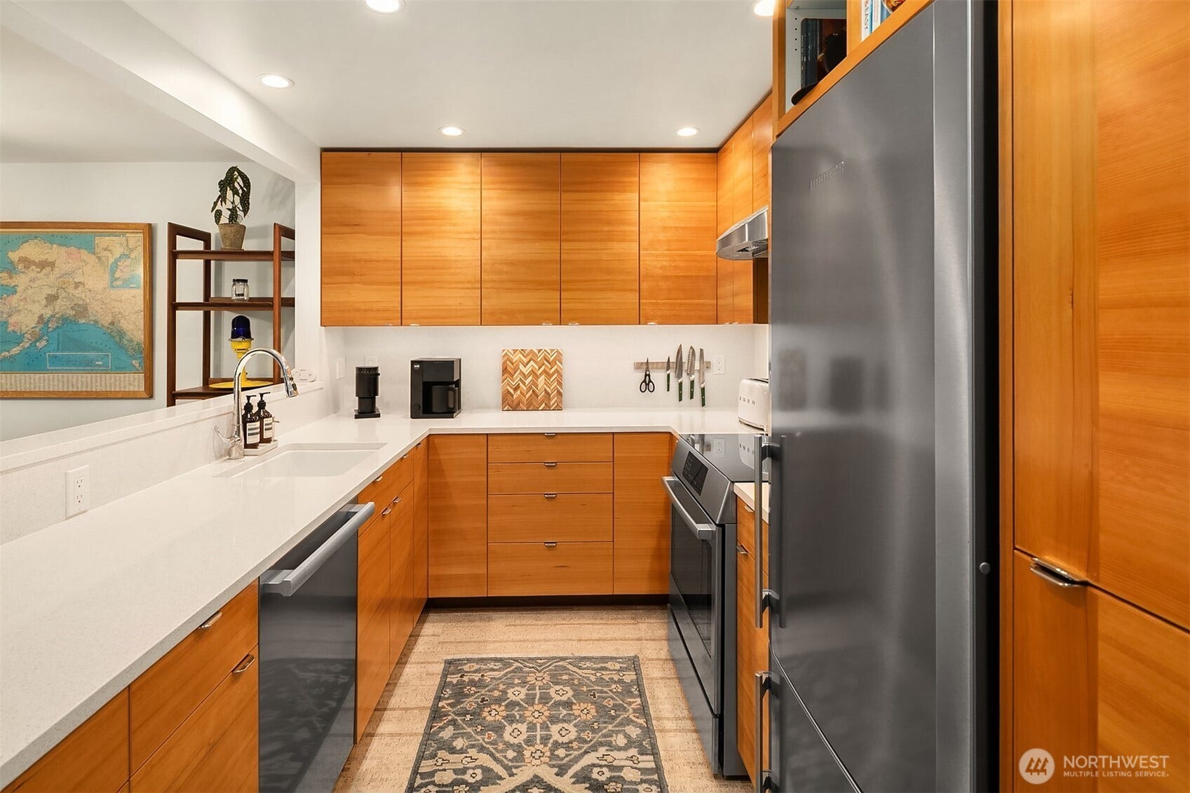 15628 8th Avenue SW, #B, Burien, WA 98166 High-end stainless appliances include a Miele Futura dishwasher, Liebherr refrigerator and Bosch range.