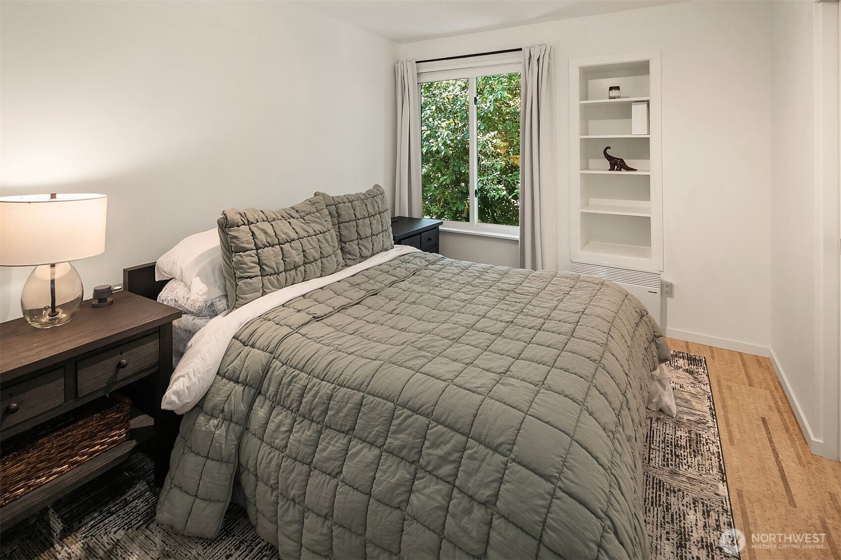 15628 8th Avenue SW, #B, Burien, WA 98166 Bedroom #3. Note the high-efficiency ceramic heater. These replaced the previous baseboard heaters throughout the home and provide added comfort and more flexibility in the spaces.