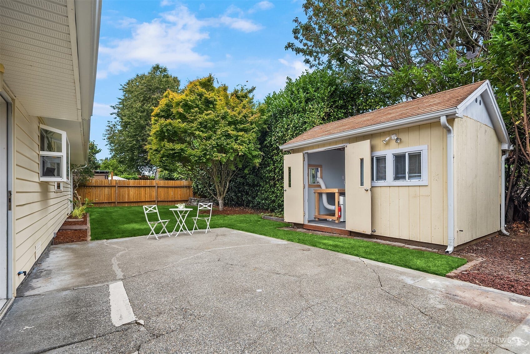 11510 27th Avenue SW, Burien, WA 98146 Spacious backyard with patio and insulated outbuilding.
