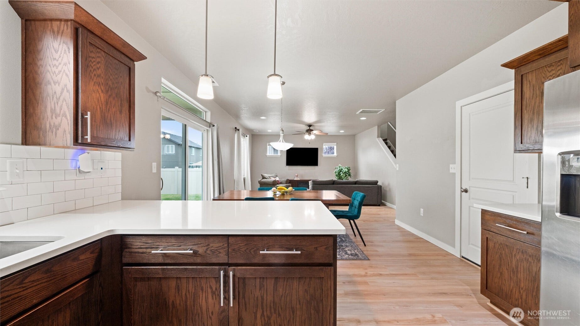 543 SW Angelina Loop, College Place, WA 99362 Kitchen with door to garage - bring in the groceries!