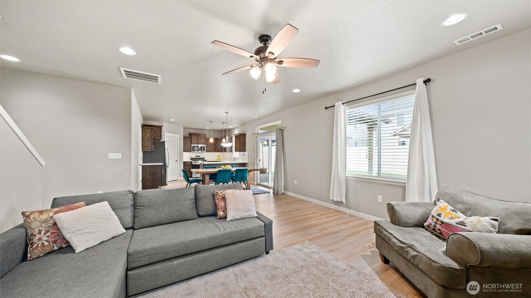 543 SW Angelina Loop, College Place, WA 99362 Living space well connected to dining and kitchen