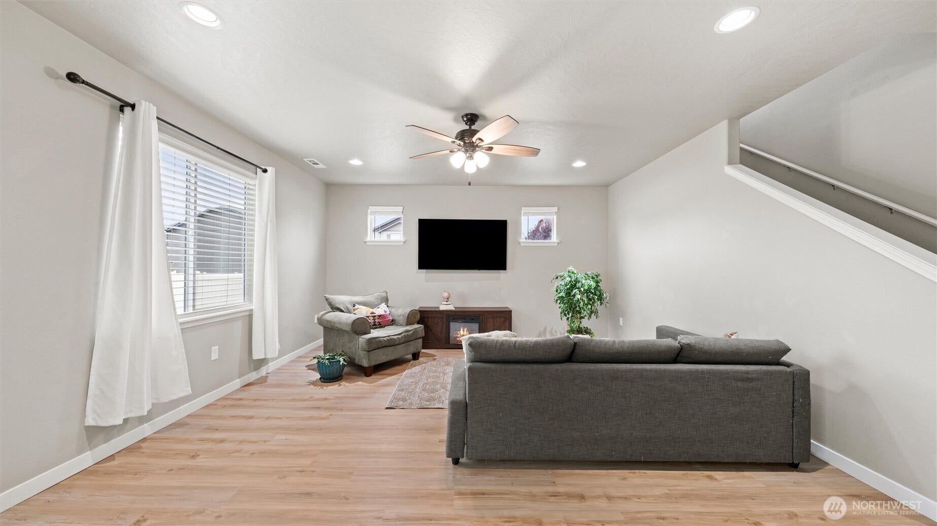 543 SW Angelina Loop, College Place, WA 99362 Living space with windows to backyard