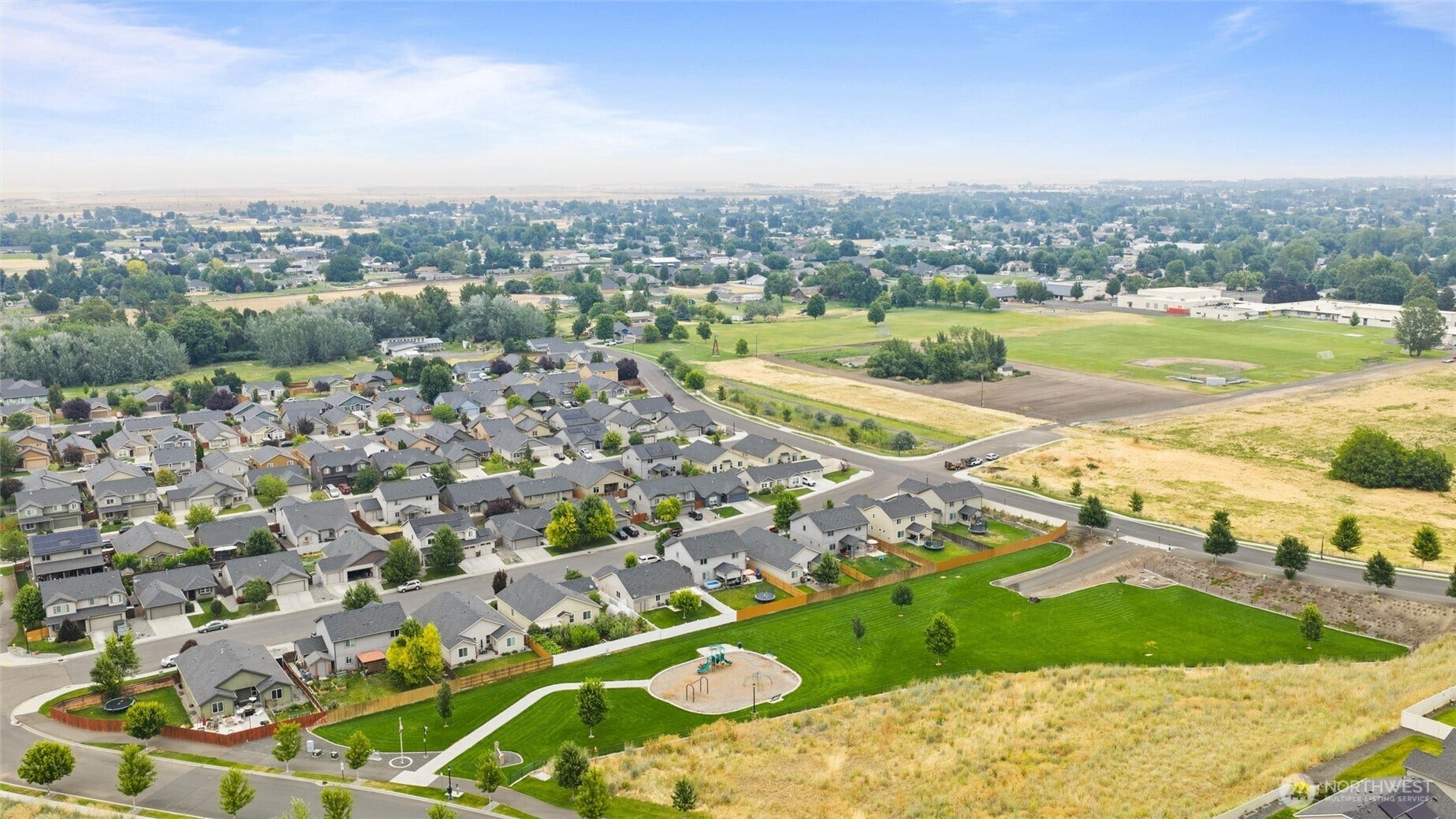 543 SW Angelina Loop, College Place, WA 99362 Smart Park with home on the hill behind