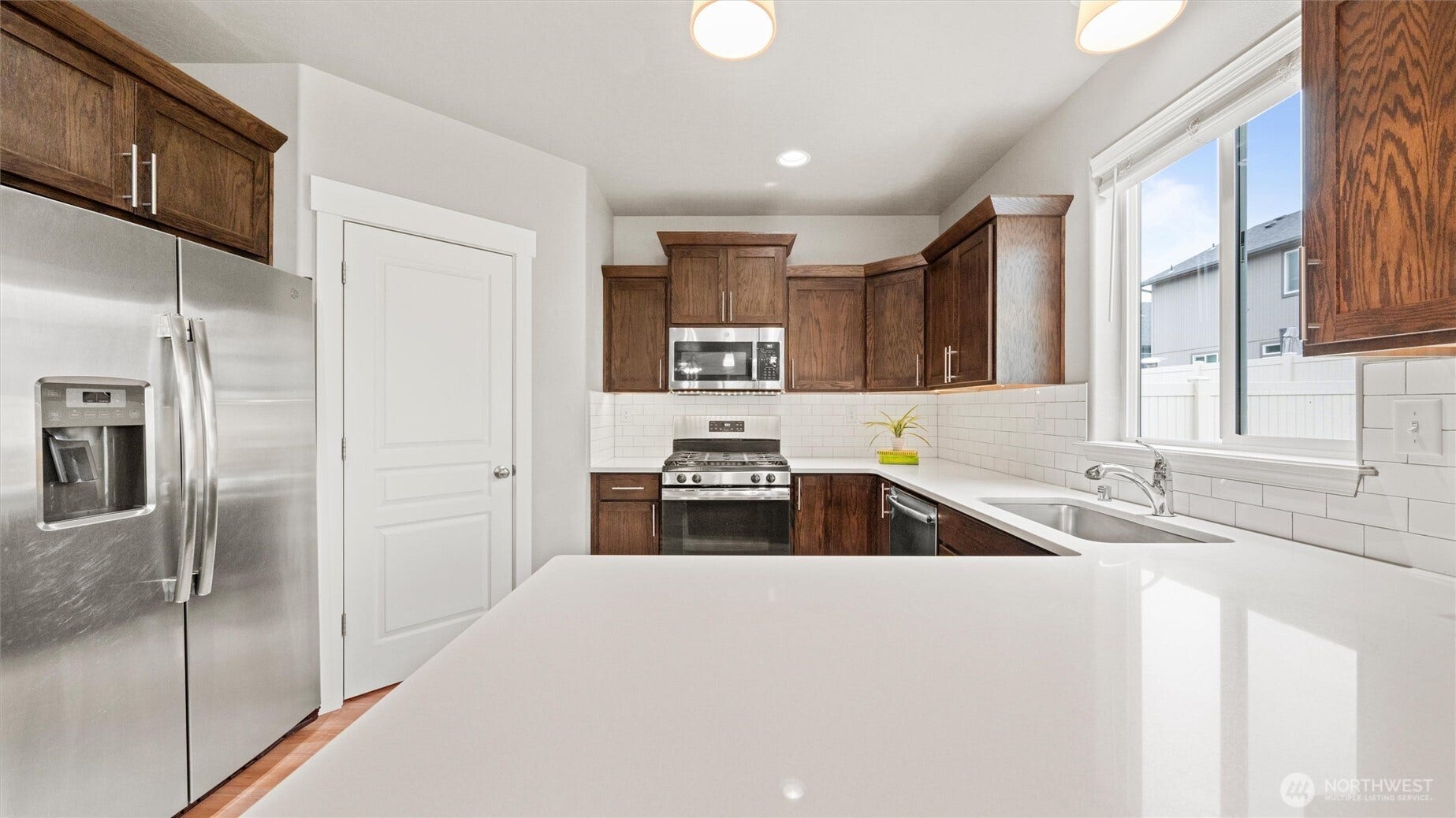 543 SW Angelina Loop, College Place, WA 99362 Kitchen with walk-in panty and stainless steel appliances