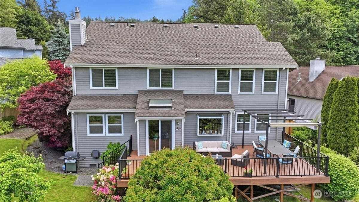 13408 SE 85th Street, Newcastle, WA 98059 Lovingly maintained and ready for its new owners! 40 year presidential roof, large custom deck and so many more upgrades to enjoy.