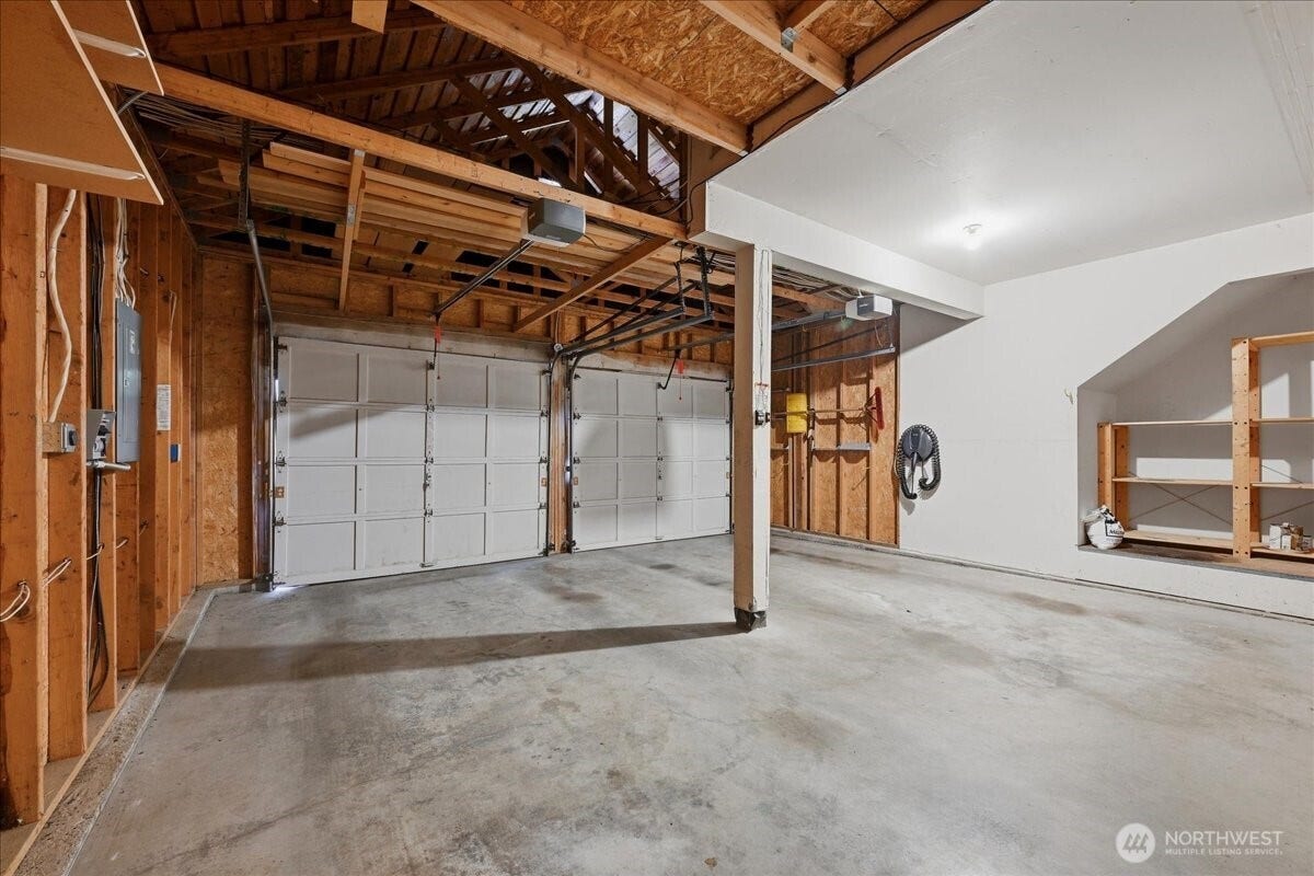 13408 SE 85th Street, Newcastle, WA 98059 Two car garage with ample storage and an electric car charger included!