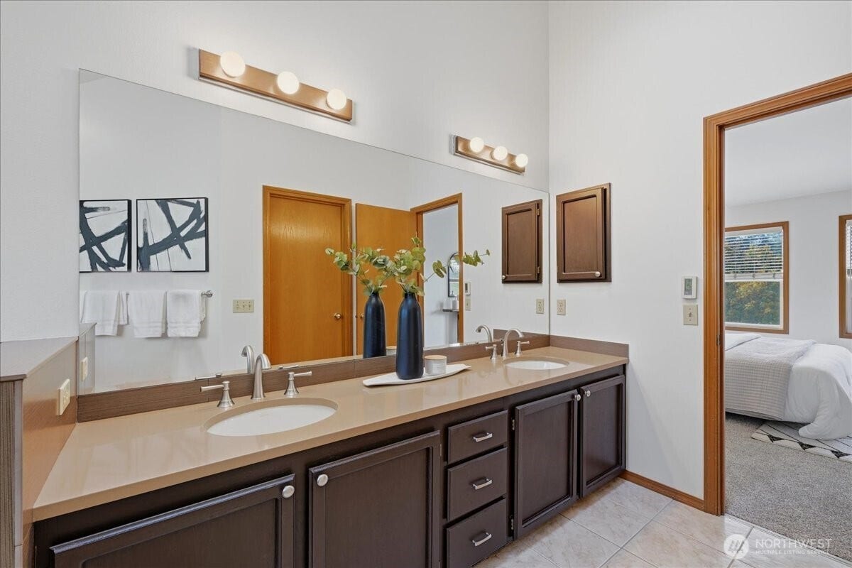 13408 SE 85th Street, Newcastle, WA 98059 Primary en-suite with vaulted ceilings and dual vanities.
