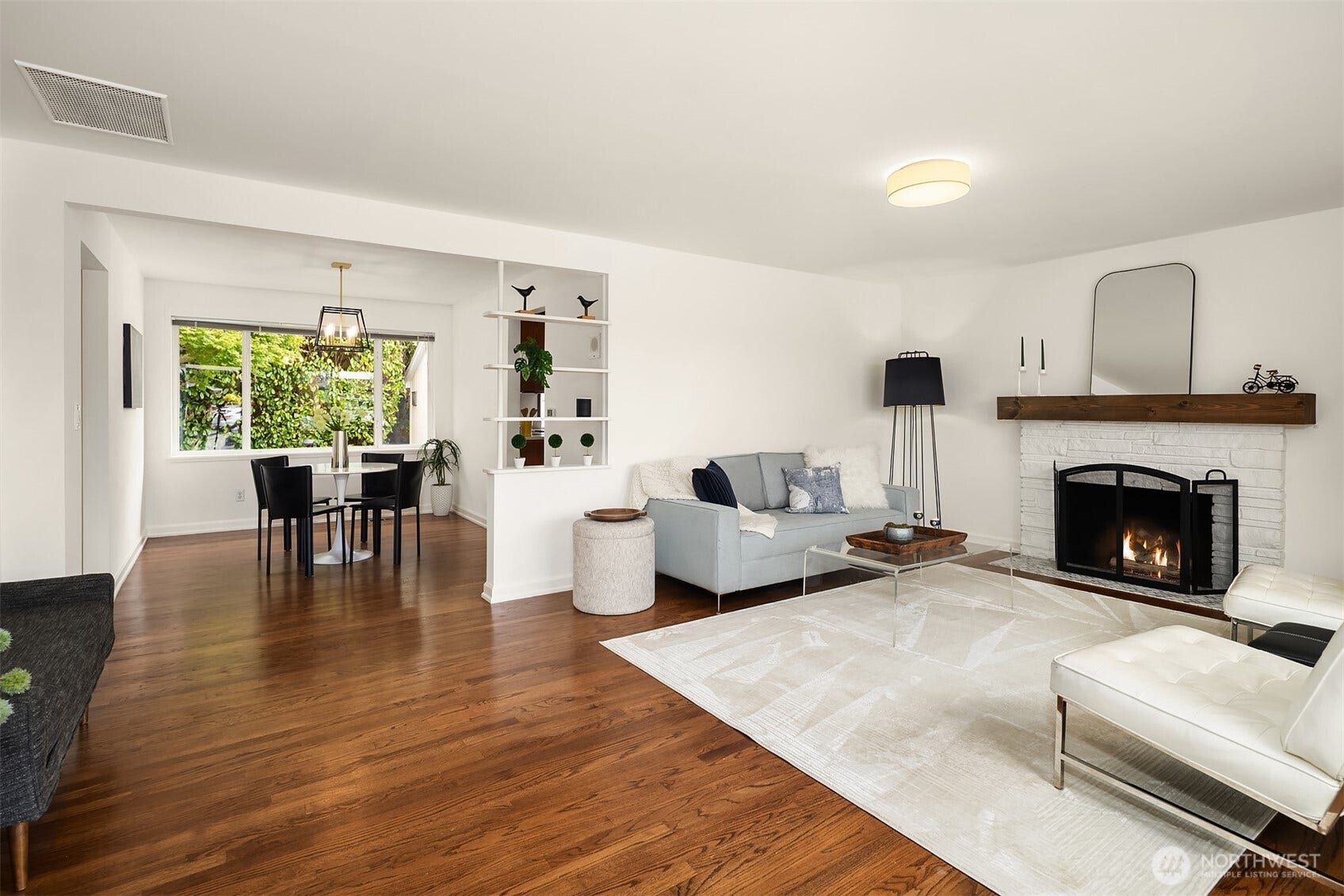 Spacious living and dining rooms with beautiful hardwoods.