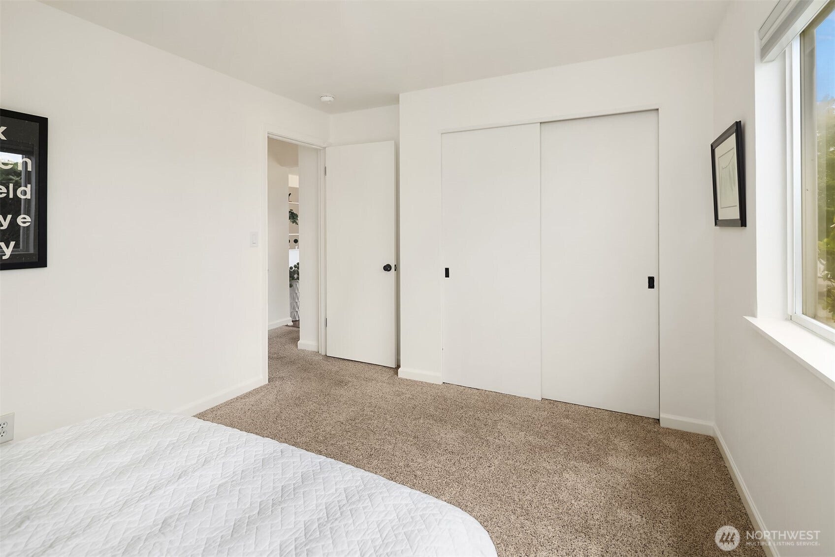 Hardwoods underneath carpeting are in good condition.
