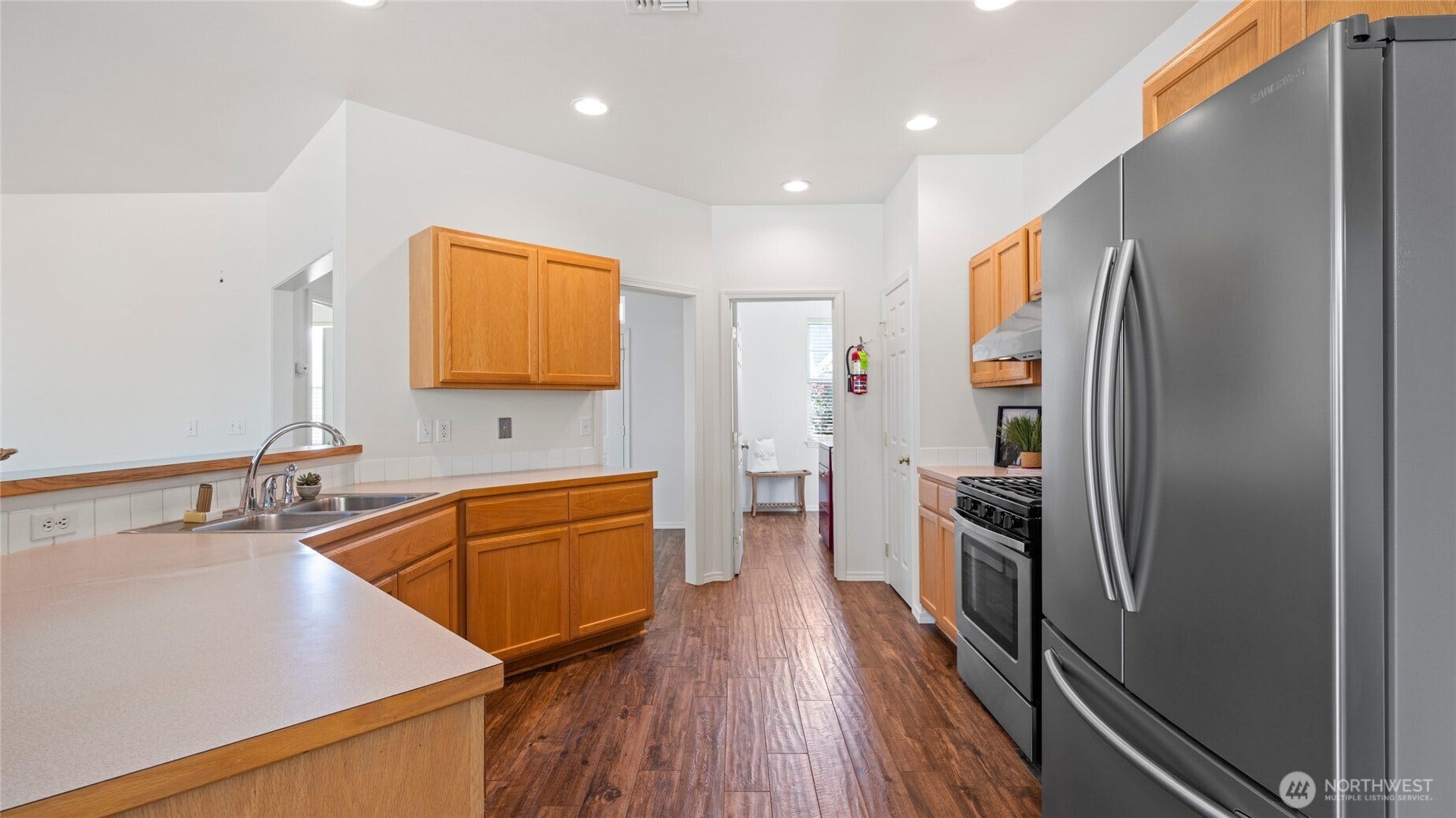 Kitchen with doorway to utility and garage