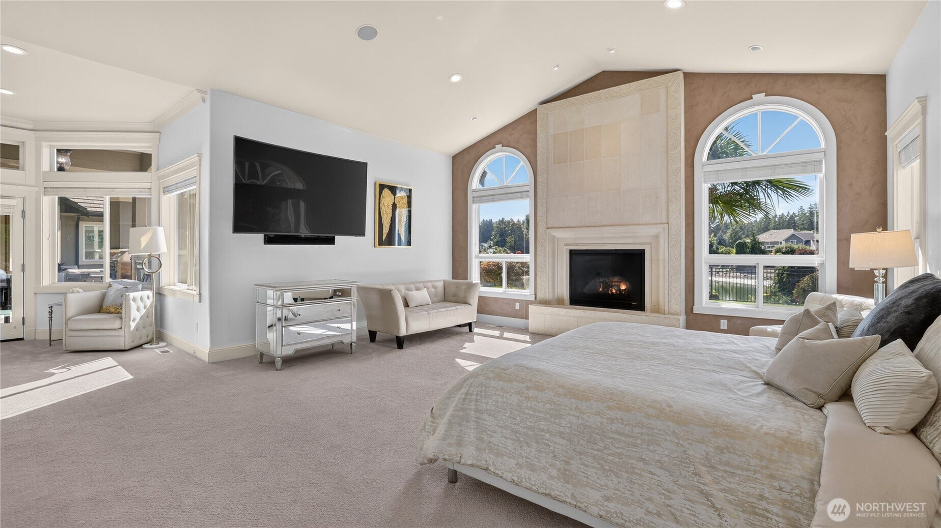 Primary Suite    The serene primary suite offers a true retreat, featuring a private walk-out patio that flows directly to the pool, creating an effortless connection to outdoor living. Inside, the suite includes a generous walk-in closet and a beautifully appointed hotel-inspired bathroom with elevated finishes and a calming, retreat-style design. A perfect blend of comfort, sophistication, and resort-level ambiance.