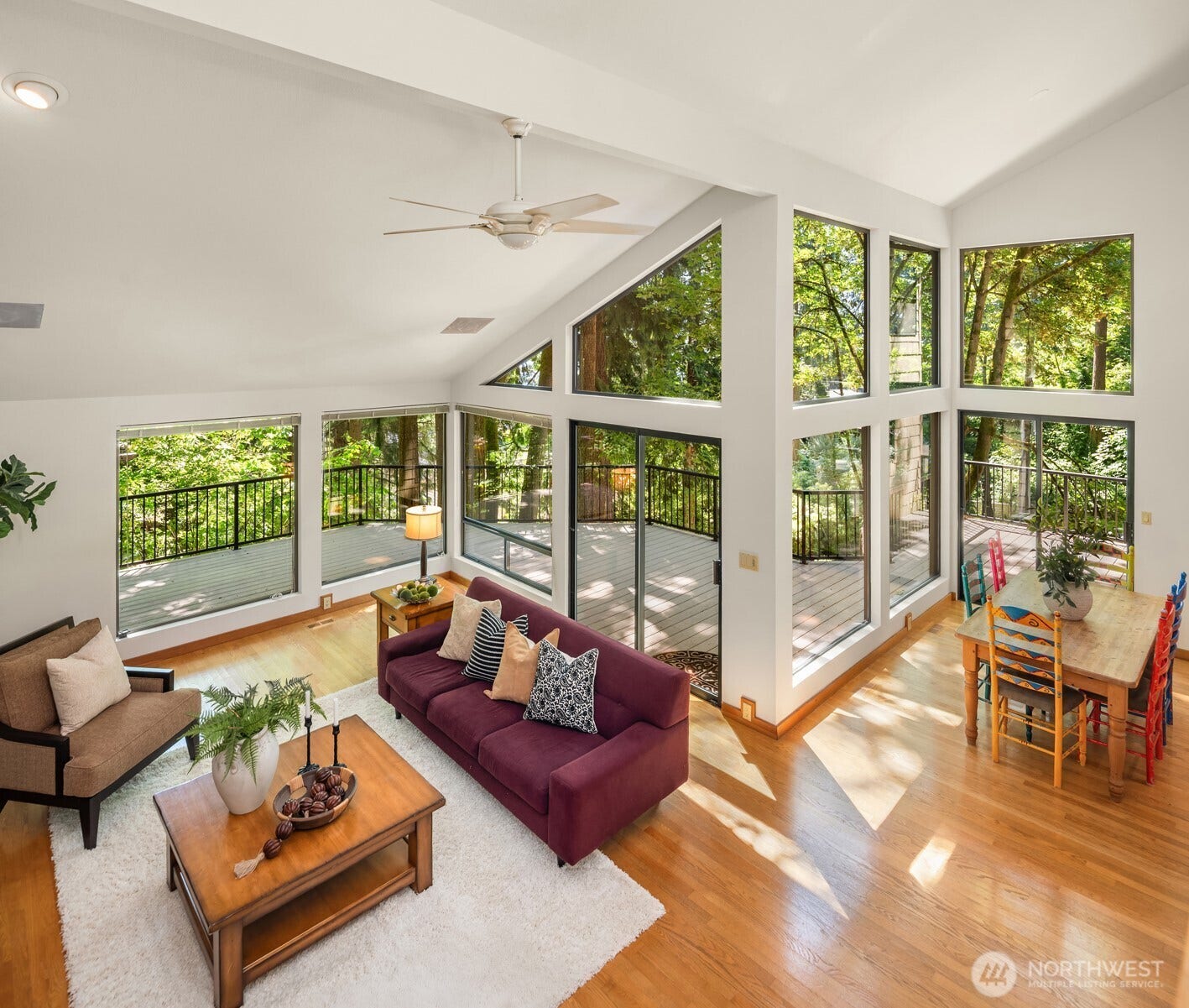 4336 E Mercer Way, Mercer Island, WA 98040 Soaring ceilings bring light & scenery into the open living & dining areas.