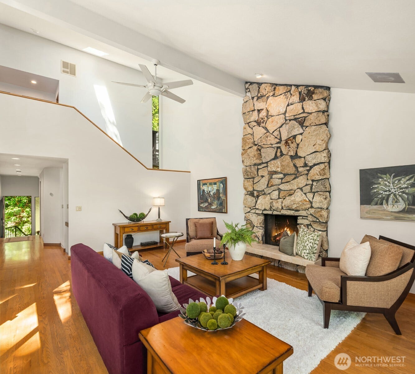 4336 E Mercer Way, Mercer Island, WA 98040 A floor-to-ceiling living room fireplace keeps you cozy throughout the cooler months.