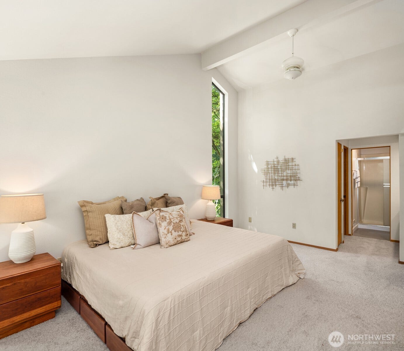 4336 E Mercer Way, Mercer Island, WA 98040 Dramatic windows maximize the light & scenery, while the cathedral ceiling includes a breezy fan.