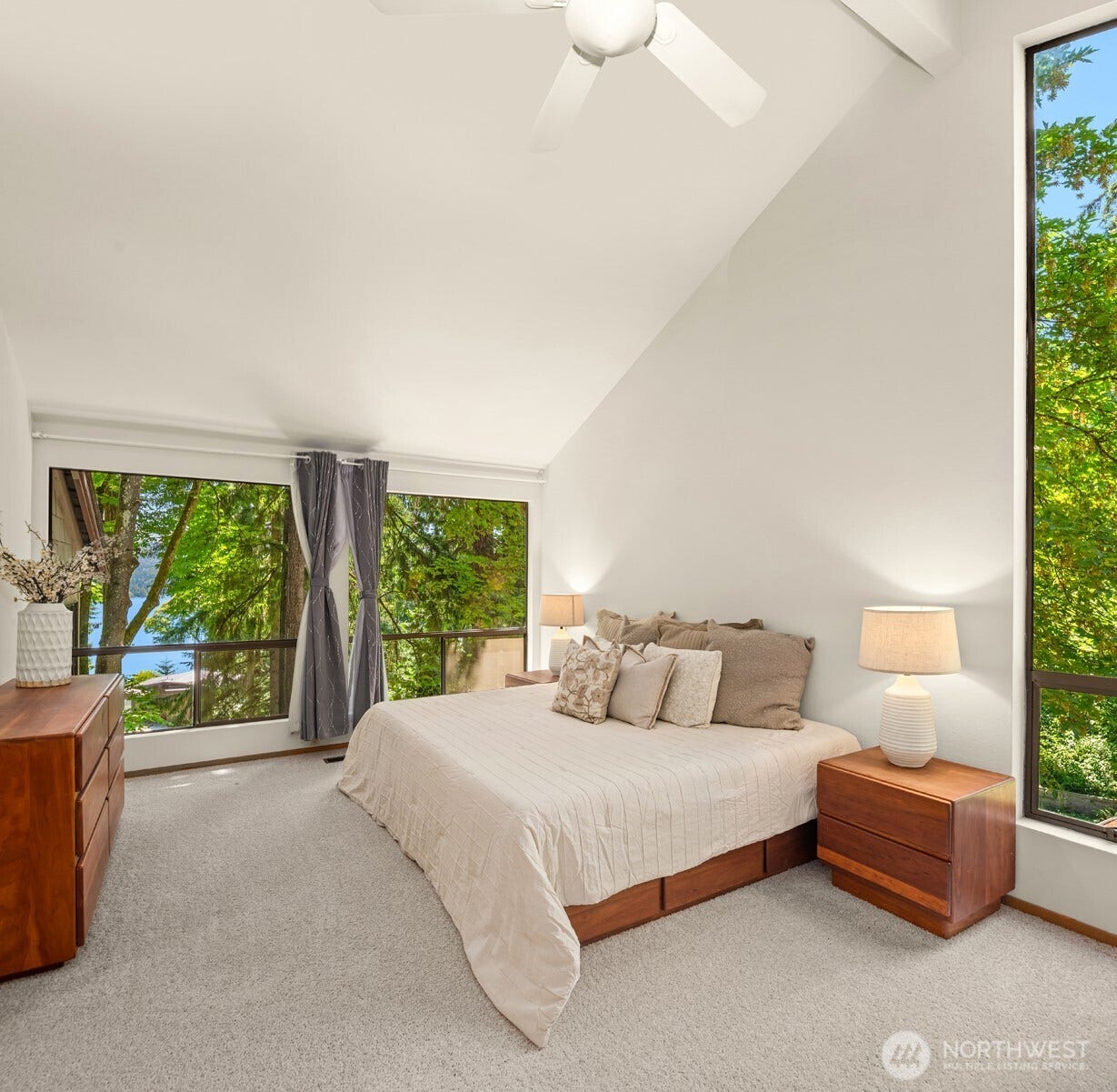 4336 E Mercer Way, Mercer Island, WA 98040 Escape to your soaring primary suite with sparkling lake views.