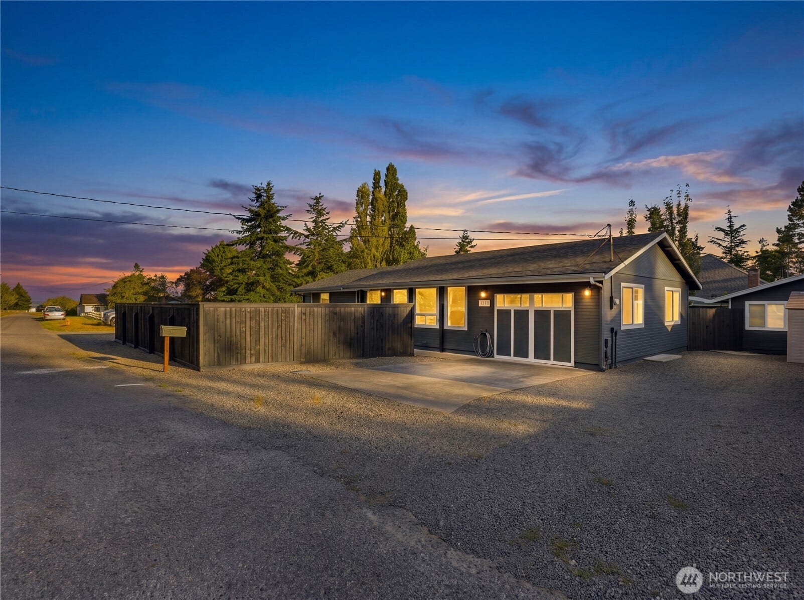 1409 1st Street, Port Townsend, WA 98368 Welcome home! Plenty of parking, including dedicated DADU parking and RV parking with full water, sewer, and electrical hookups.