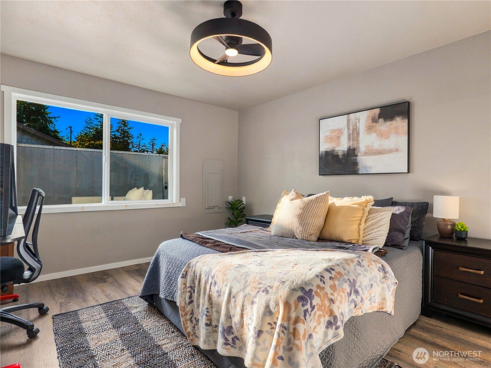 1409 1st Street, Port Townsend, WA 98368 Converted garage offers flexible bonus space, currently used as a shared bedroom and officeperfect for guests, hobbies, a home gym, or additional living space.