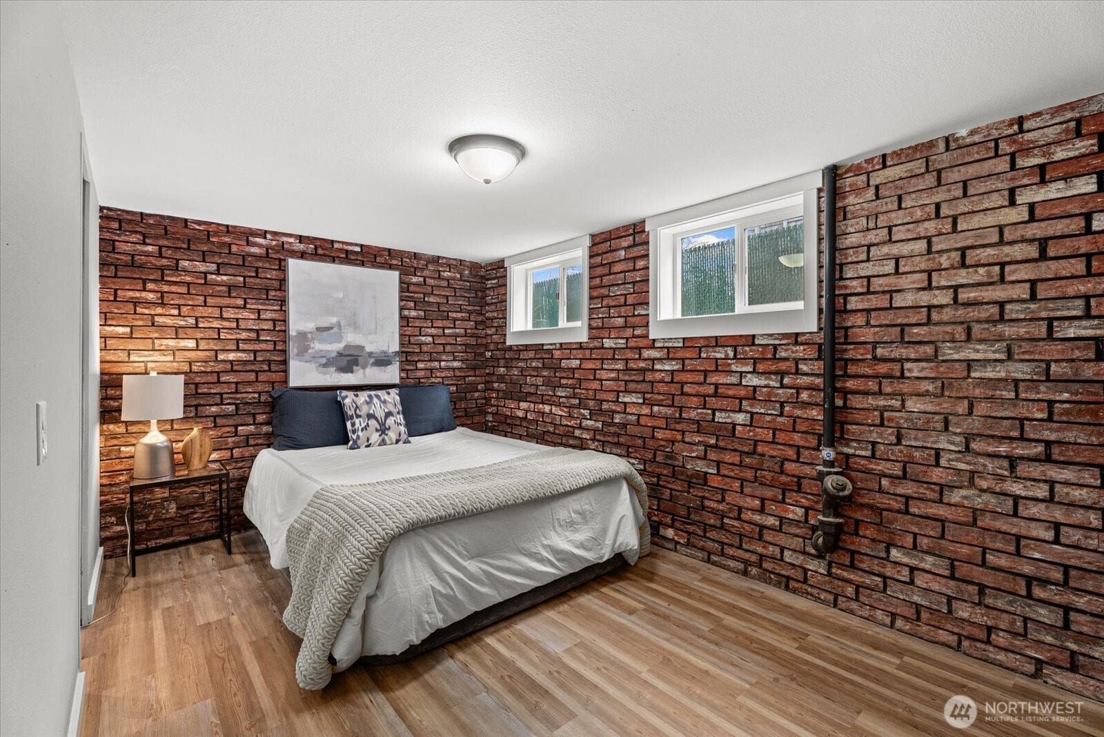 1020 S 43rd Street, Tacoma, WA 98418 Lower level Bedroom has ithe benefit of having an exterior entrance