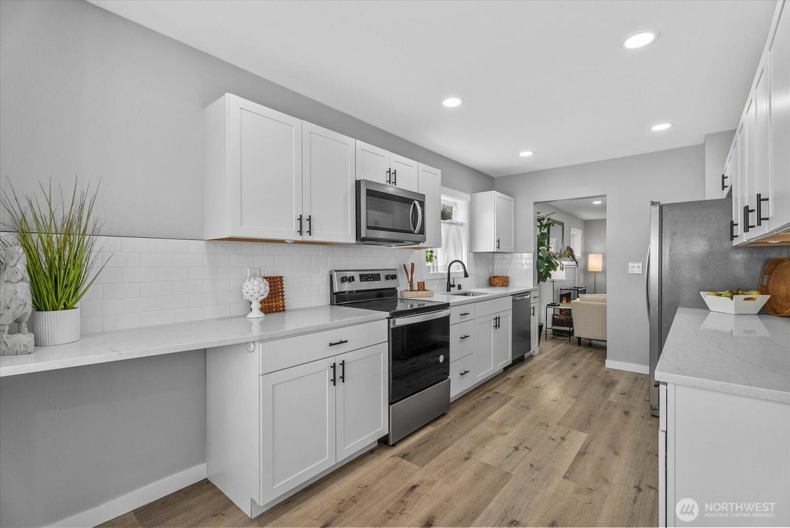 1020 S 43rd Street, Tacoma, WA 98418 Stainless Appliances adds to this great Kitchen.