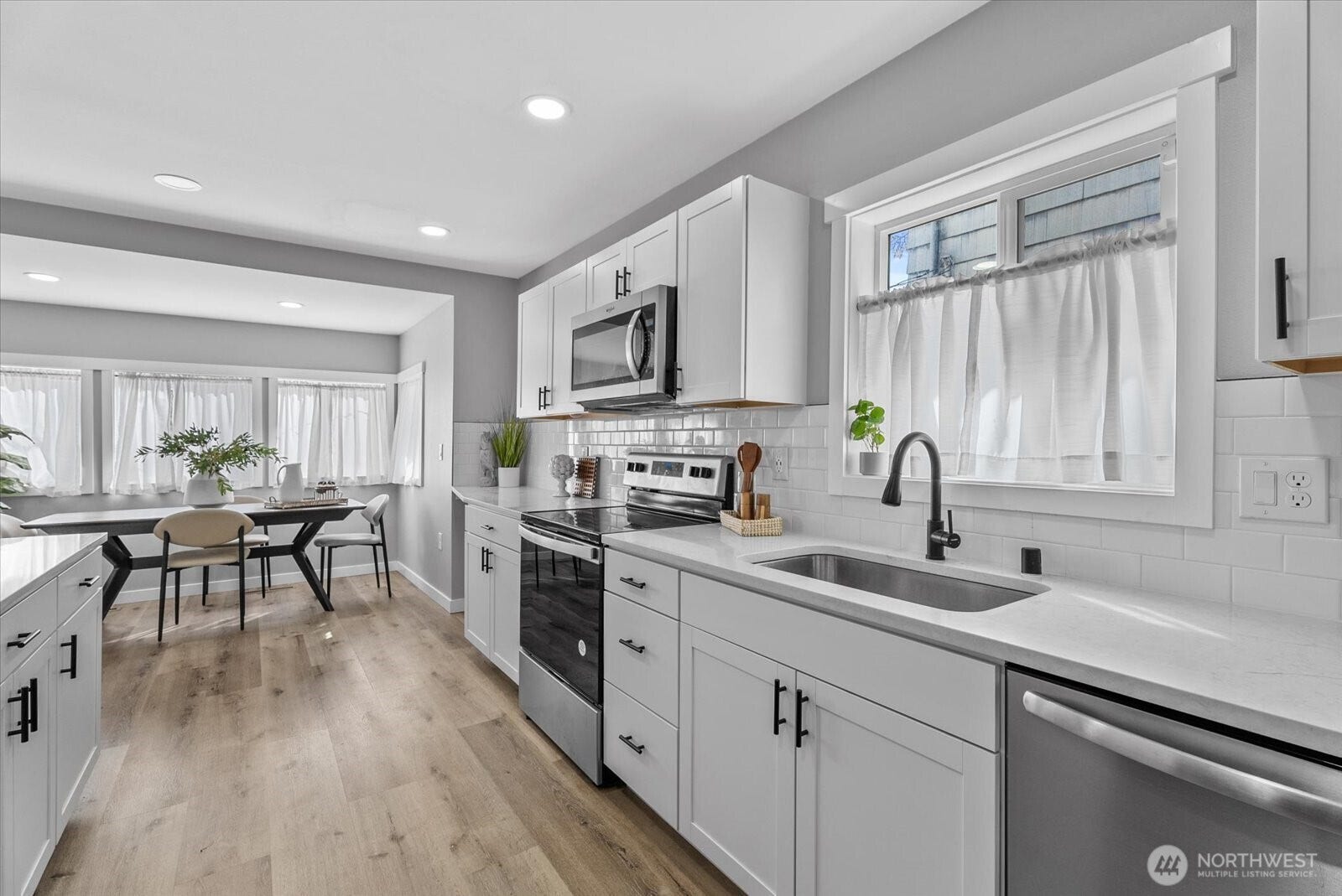 1020 S 43rd Street, Tacoma, WA 98418 This great Kitchen was updated 3 years ago with All new cabinetry, Stainless Appliances, Flooring.