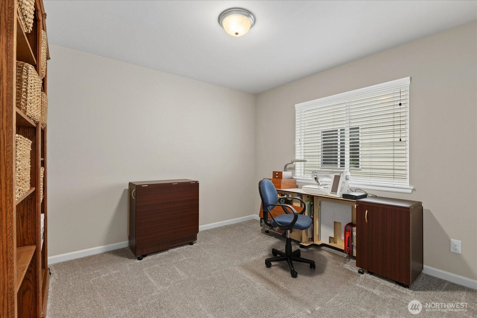 10419 11th Street Ct E, Edgewood, WA 98372 This spacious Bedroom is being used as a sewing room for the seller
