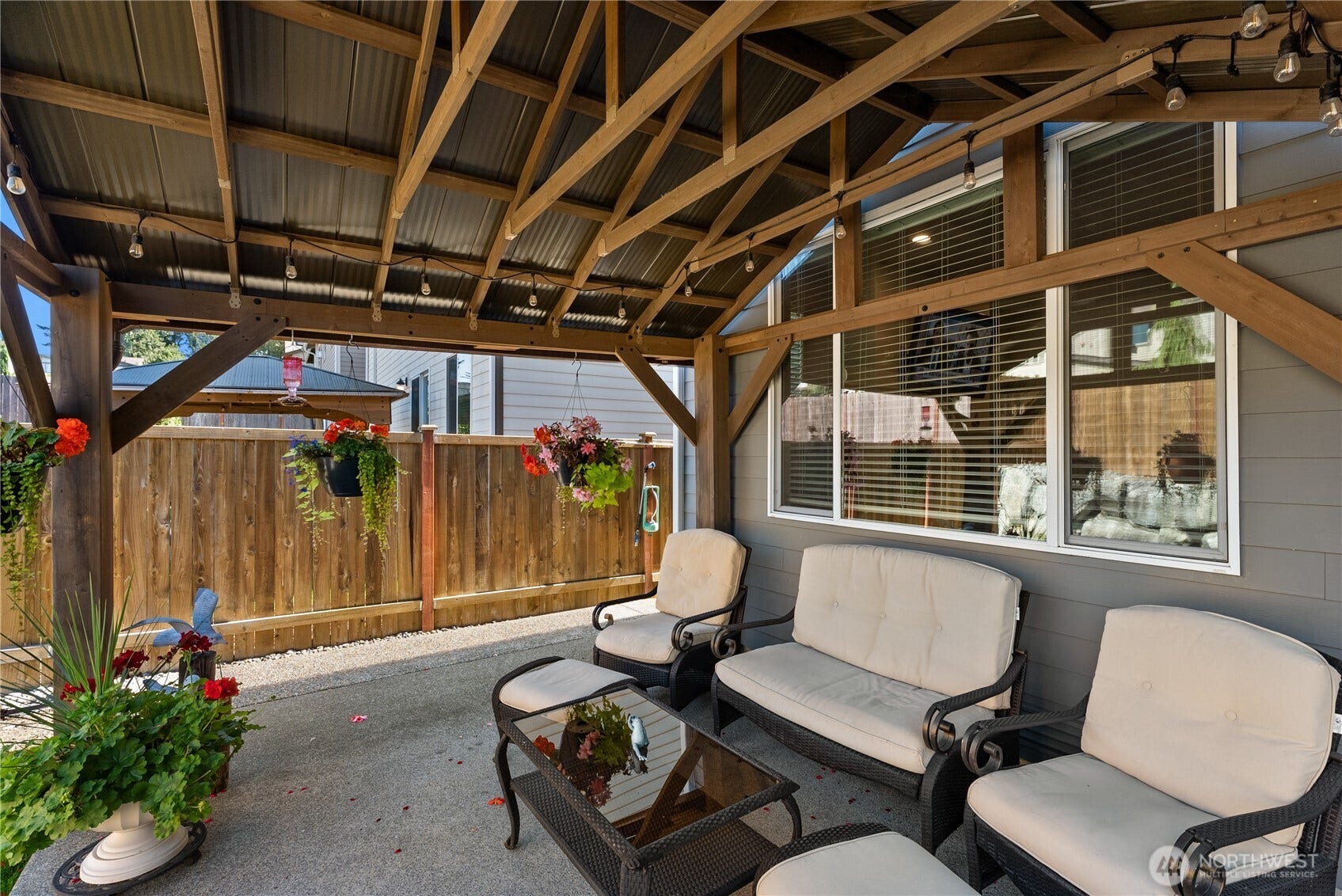 10419 11th Street Ct E, Edgewood, WA 98372 Lots of room for everyone to relax in comfort under this Timber built structure.