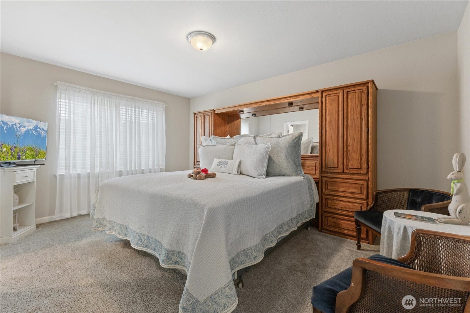 10419 11th Street Ct E, Edgewood, WA 98372 A large Primary Bedroom features an elegant spa like Bath and huge walk-in closet.