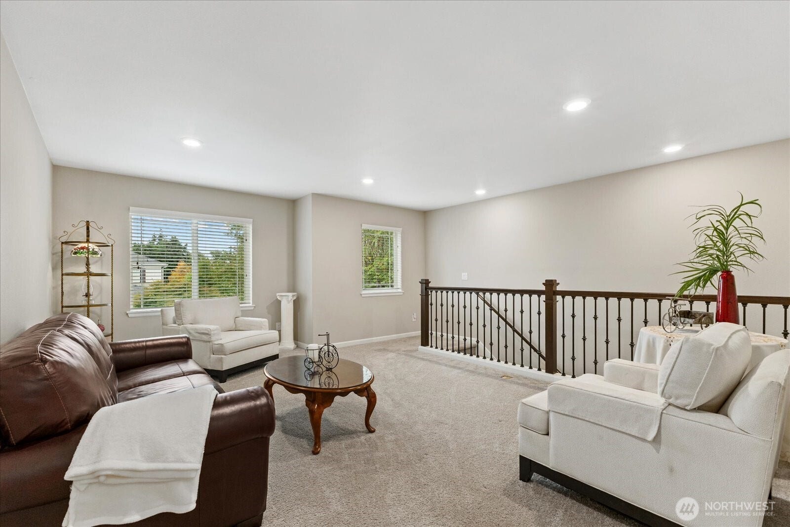 10419 11th Street Ct E, Edgewood, WA 98372 The Bonus Loft offers another room for entertainment. A Very Large Big screen will easily fit the Huge wall across from the stairs case.