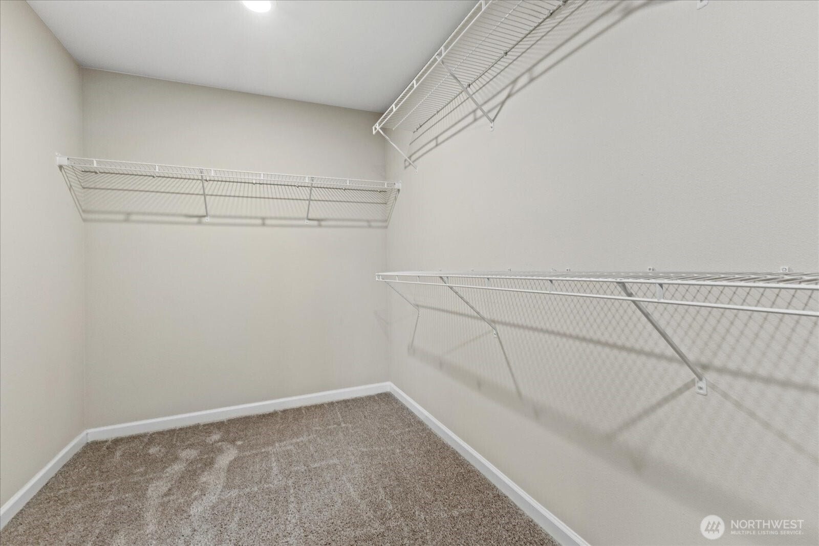 10419 11th Street Ct E, Edgewood, WA 98372 WOW and this is just one side of the large Primary Closet! The sellers clothes are in the other end.