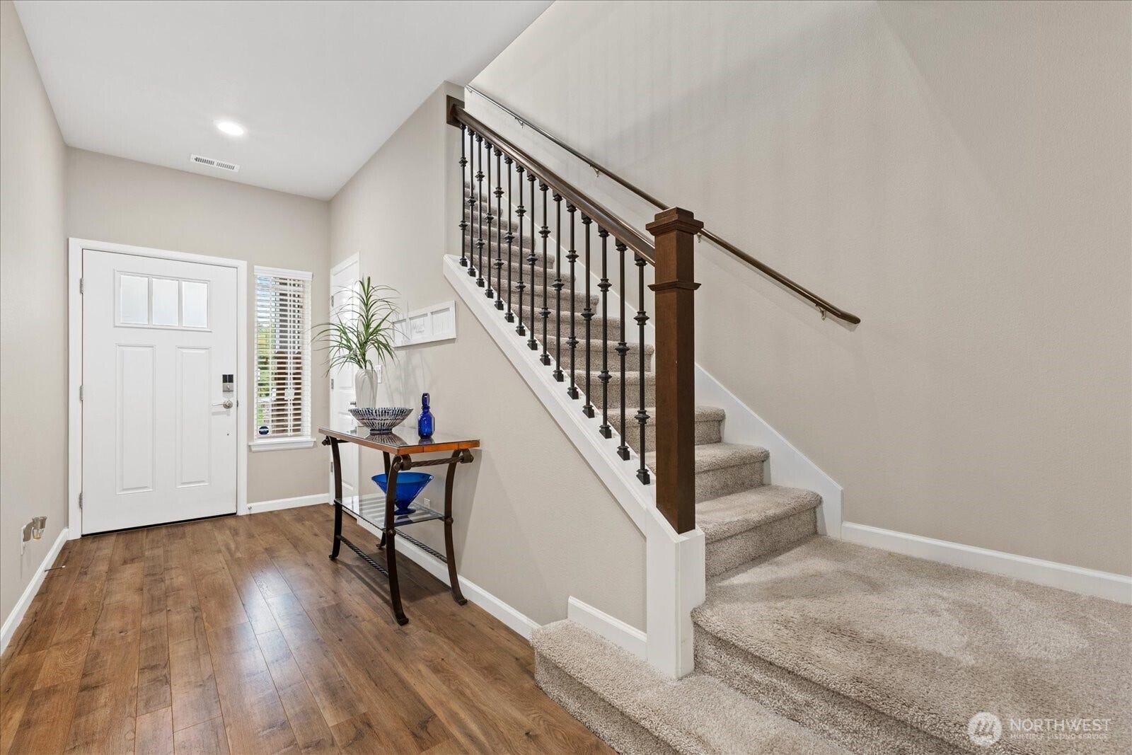 10419 11th Street Ct E, Edgewood, WA 98372 This lovely Entry Foyer with gleaming engineered wood floors welcomes guests.